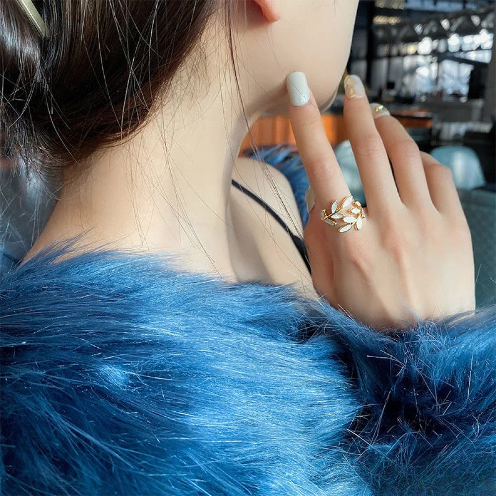 Adjustable Gold Ring Featuring a White Opal Leaf