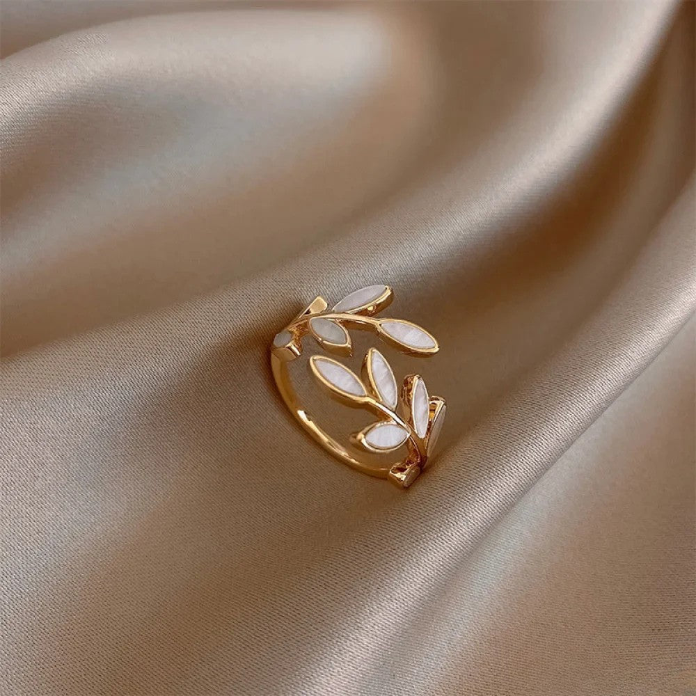 Adjustable Gold Ring Featuring a White Opal Leaf